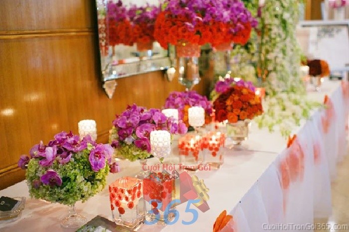 Trang trí bàn ký tên tông màu cam xanh biển  trong tiệc cưới tại nhà hàng sang trọng, ấn tượng TTBKT55 : Mẫu cưới hỏi trọn gói 365 của công ty dịch vụ trang trí nhà tiệc cưới hỏi đẹp rẻ uy tín ở tại quận Tân Phú Sài Gòn TPHCM Gò Vấp