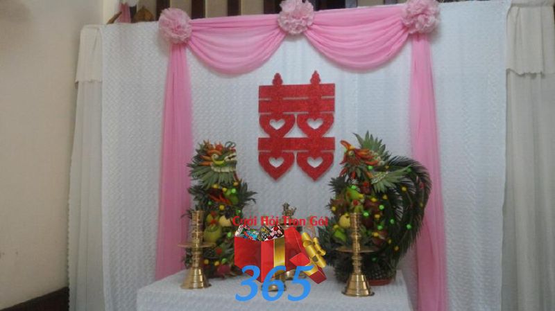 Trang trí bàn thờ gia tiên ngày cưới tông màu hồng BT35 : Mẫu cưới hỏi trọn gói 365 của công ty dịch vụ trang trí nhà tiệc cưới hỏi đẹp rẻ uy tín ở tại quận Tân Phú Sài Gòn TPHCM Gò Vấp