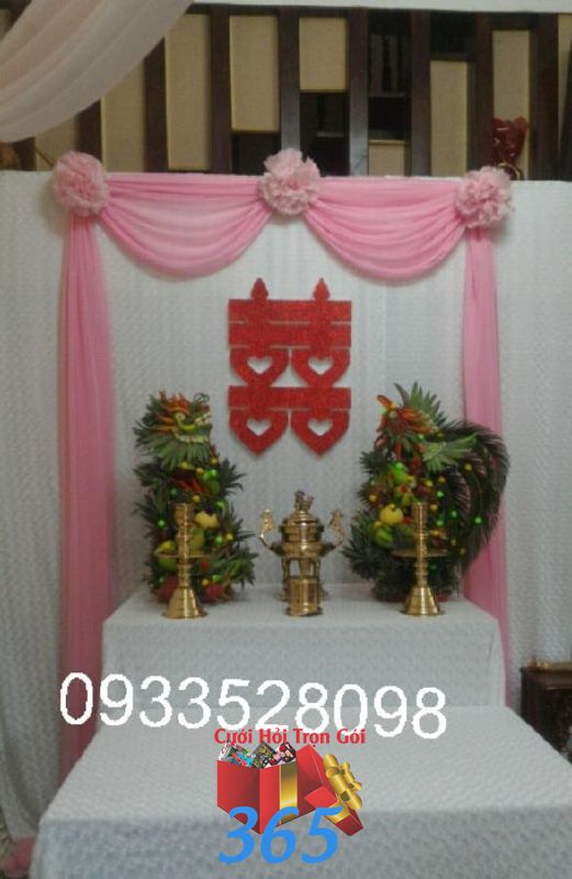 Trang trí bàn thờ gia tiên ngày cưới tông màu hồng BT36 : Mẫu cưới hỏi trọn gói 365 của công ty dịch vụ trang trí nhà tiệc cưới hỏi đẹp rẻ uy tín ở tại quận Tân Phú Sài Gòn TPHCM Gò Vấp