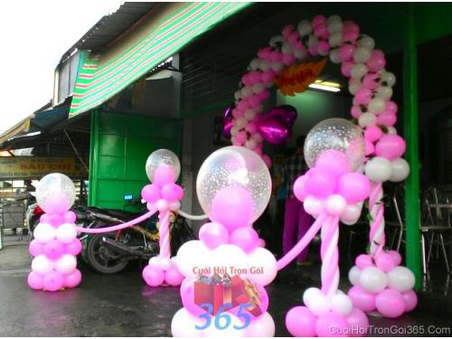Shop dịch vụ cưới hỏi cưới hỏi 365 | công ty, shop cưới hỏi: trang trí nhà đám cưới, bàn thờ gia tiên, cắt dán chữ; cổng hoa tươi, cổng hoa vải, hoa cầm tay, hoa để bàn, hoa trang trí ngày cưới; mâm quả cưới hỏi, nhân sự bưng quả ; cho thuê bàn ghế, nhà bạt, khung rạp - Cổng cưới bong bóng màu hồng phấn kết theo yêu CBB16